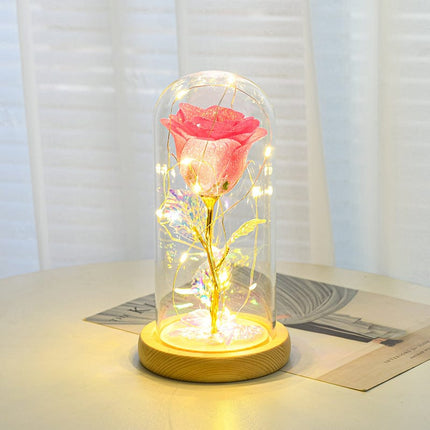 EVIG ROSEBLOMST I GLASS MED LED-LYS